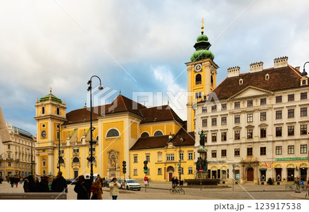 Church Schottenkirche and Schottenstift monastery on square in Vienna Church Schottenkirche and Schottenstift monastery on square in Vienna 123917538