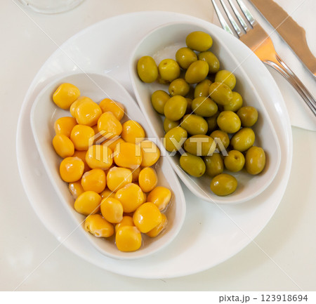 Delicious spanish tapas from olives and pickled beans 123918694