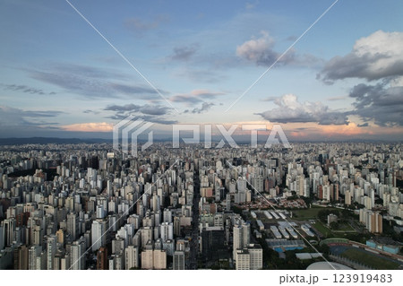 View of Sao Paulo skyline at dusk with clouds in the sky and city lights 123919483