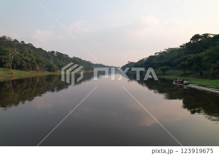 River journey through lush rainforest in a remote area near Amazon River journey through lush rainforest in a remote area near Amazon 123919675