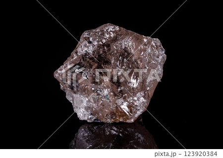 Macro mineral stone smoky quartz Rauch topaz on black background Macro mineral stone smoky quartz Rauch topaz on black background 123920384