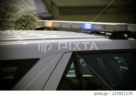 Police Car with Flashing Emergency Lights Close-up Police Car with Flashing Emergency Lights Close-up 123921170