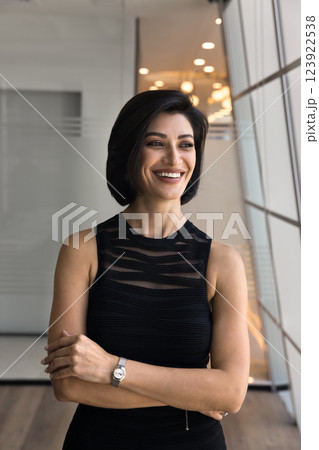 Elegant mature woman business leader look aside with confident smile 123922538