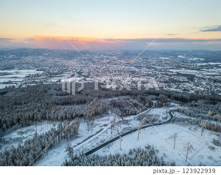 A stunning winter evening reveals white snow covering Liberec City and its surroundings in Czechia. 123922939