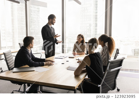 Millennial European businessman in suit lead formal meeting 123923095