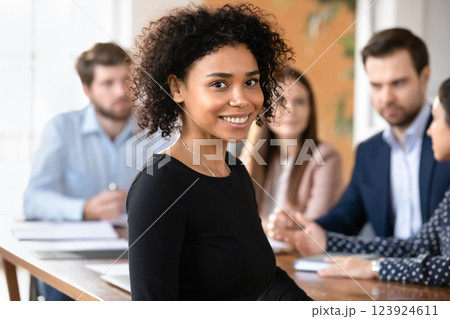 African businesswoman, corporate briefing participant smiling, look at camera 123924611