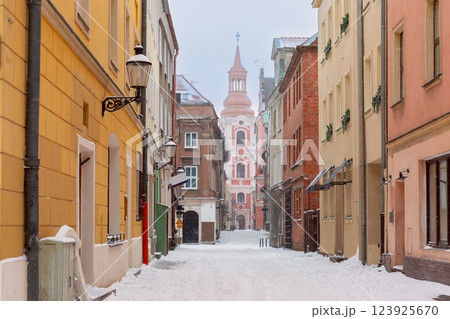 Fara Church Facade and Old Street in Poznan, Poland 123925670