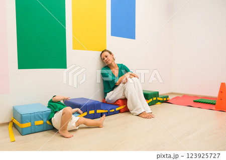 child and mom in kindergarten gym child and mom in kindergarten gym 123925727