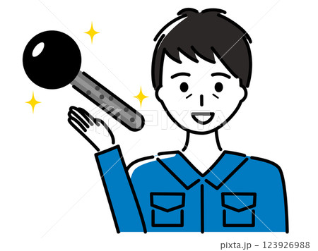 鍵を紹介する作業服を着た中年男性 123926988