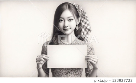 Elegant Asian Woman in Indonesia Traditional batik Holding a Blank Sign with Generative AI. 123927722