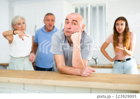 Portrait of a thoughtful man who had a conflict with family Portrait of a thoughtful man who had a conflict with family 123929005