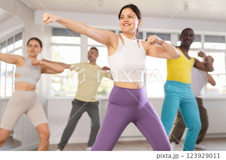 Group of people dancing modern dances Group of people dancing modern dances 123929011
