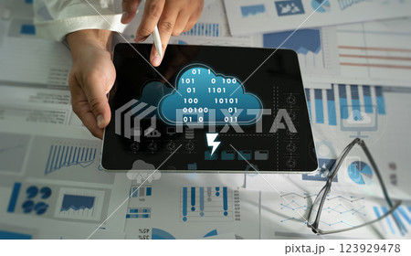 cloud service to document A businessman uses cloud technology to access, store, and share digital files securely. AI and cybersecurity tools ensure safe online data transfer and management. cloud service to document A businessman uses cloud technology to access, store, and share digital files securely. AI and cybersecurity tools ensure safe online data transfer and management. 123929478