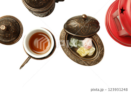 PNG, Ramadan. Red lamp in Moroccan style with traditional attributes, isolated on white background. PNG, Ramadan. Red lamp in Moroccan style with traditional attributes, isolated on white background. 123931248