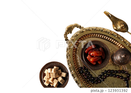 PNG, Ramadan. Copper tray with traditional food - dried fruits, isolated on white background. PNG, Ramadan. Copper tray with traditional food - dried fruits, isolated on white background. 123931392