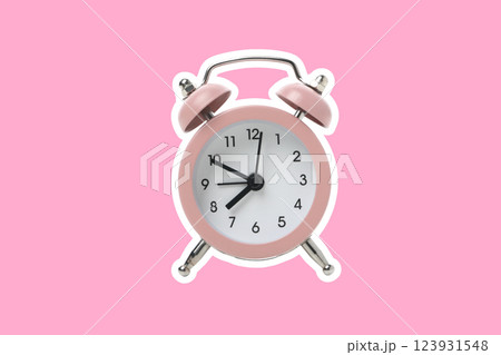 Spring Forward. Pink alarm clock on a pink background. Spring Forward. Pink alarm clock on a pink background. 123931548