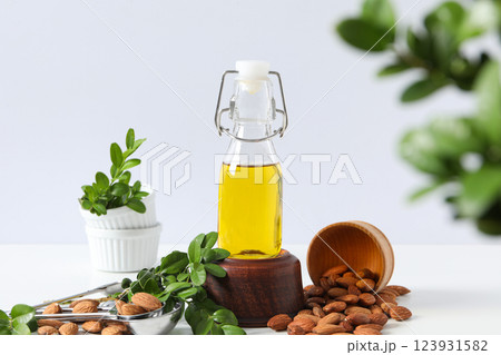 Skin care and body care concept - almonds, almond oil Skin care and body care concept - almonds, almond oil 123931582