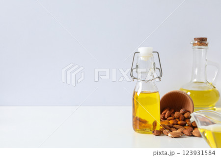 Skin care and body care concept - almonds, almond oil 123931584