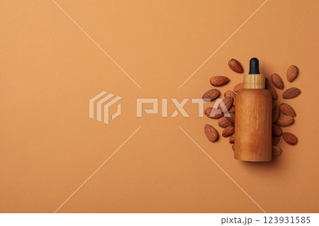 Skin care and body care concept - almonds, almond oil 123931585