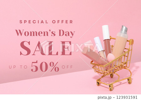 8 March, international women's day, golden trolley with cosmetics on a pink background, with text 8 March, international women's day, golden trolley with cosmetics on a pink background, with text 123931591