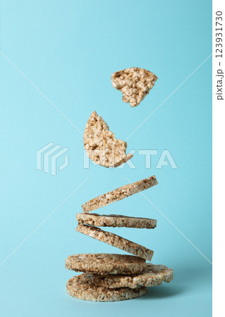 Crisps bread levitated, on a blue background. Crisps bread levitated, on a blue background. 123931730