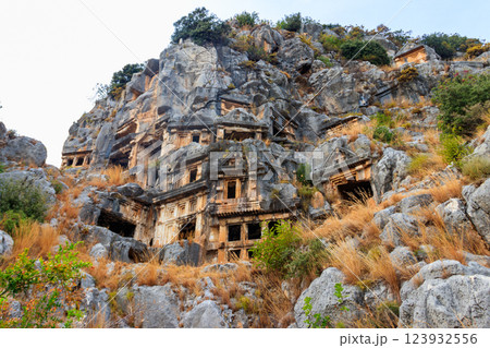 Rock-cut tombs of Lycian necropolis of the ancient city of Myra in Demre, Antalya province in Turkey Rock-cut tombs of Lycian necropolis of the ancient city of Myra in Demre, Antalya province in Turkey 123932556