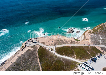 Tourists exploring Cabo da Roca monument with Tourists exploring Cabo da Roca monument with 123932647