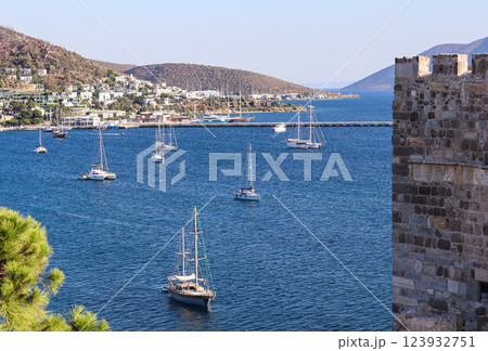 View from Castle on Bodrum city, green mountains, blue sea and port with yachts. Traveling concept 123932751