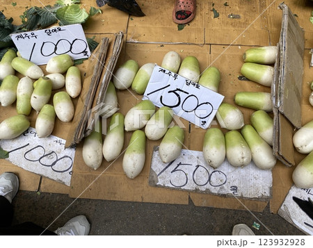 orean Radishes Sold in Bundles for 2000 KRW at the Marke 123932928