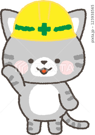 片手を挙げるヘルメットを被ったネコ 123938565