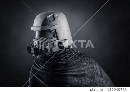 Man with helmet over dark misty background 123940731