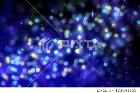 黒と青のグラデーションのキラキラ背景　イルミネーション　玉ボケ　光 123941159