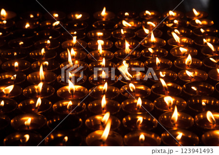 Detail view of tealights in row Detail view of tealights in row 123941493