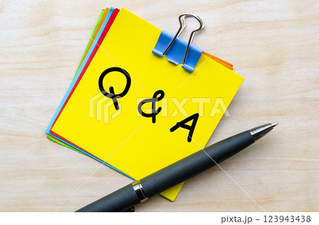 Q and A text on yellow notepad. Question and Answer concept 123943438