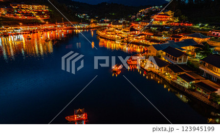 Illuminated Chinese Mountain Village at Night 123945199