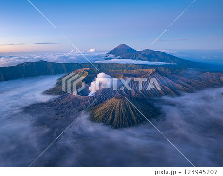 Aerial View of Mount Bromo is surrounded by mist and dramatic landscapes. 123945207
