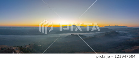 Aerial View of sweet sky in Sunrise in the valley over mist. 123947604