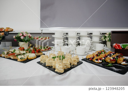 Delicacies and snacks at the buffet or banquet. Catering. 123948205