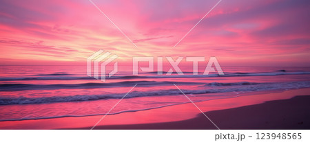 Pink sunset over the sea, a wide landscape 123948565