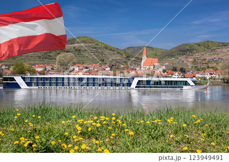 Durnstein village with Austrian flag during spring time in Wachau, Austria Durnstein village with Austrian flag during spring time in Wachau, Austria 123949491
