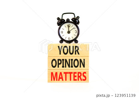 Your opinion matters symbol. Concept words Your opinion matters on beautiful wooden blocks. Beautiful white background. Black alarm clock. Business your opinion matters concept. Copy space. Your opinion matters symbol. Concept words Your opinion matters on beautiful wooden blocks. Beautiful white background. Black alarm clock. Business your opinion matters concept. Copy space. 123951139