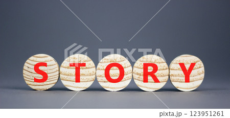 Story symbol. Concept word Story on beautiful wooden circles. Beautiful grey table grey background. Business lifestyle story concept. Copy space. 123951261