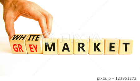 Grey or white market symbol. Concept words Grey market or White market on beautiful wooden blocks. Beautiful white background. Businessman hand. Business grey or white market concept. Copy space. 123951272