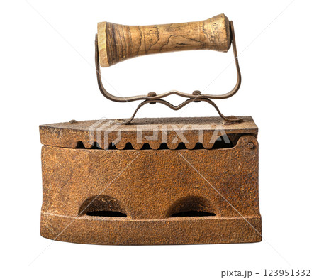 Old rusty charcoal iron isolated on white background showing history of laundry Old rusty charcoal iron isolated on white background showing history of laundry 123951332
