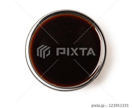 Small glass bowl with soy sauce or balsamic vinegar on white background Small glass bowl with soy sauce or balsamic vinegar on white background 123951335