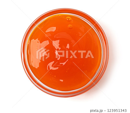 Apricot jam in a glass bowl on white background Apricot jam in a glass bowl on white background 123951343