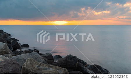 Golden Hour Embrace Over the Bay 123952548