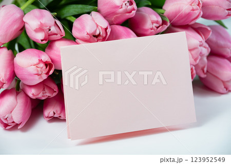 Mothers day, Valentines Day, Birthday celebration concept. Greeting card. Beautiful Bouquet of pink delicate tulips. Copy space for text, top view. Spring background. March 8, International Womens Day Mothers day, Valentines Day, Birthday celebration concept. Greeting card. Beautiful Bouquet of pink delicate tulips. Copy space for text, top view. Spring background. March 8, International Womens Day 123952549