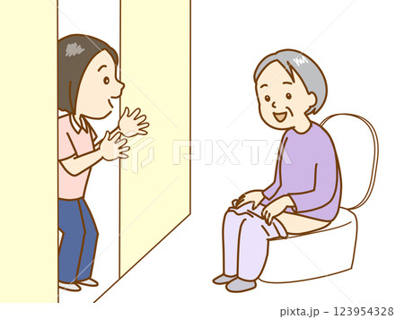 トイレの高齢者に声をかける介護士 123954328