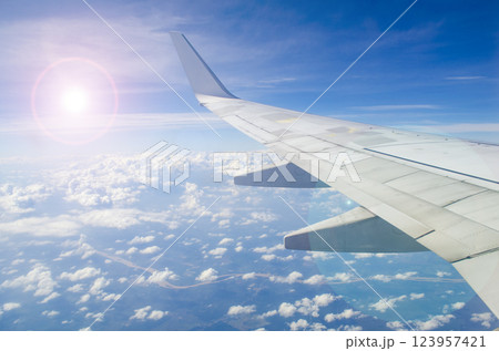 Chasing Sunsets and Destinations from the Sky. Travel, Getaway, and Holiday Concept. Chasing Sunsets and Destinations from the Sky. Travel, Getaway, and Holiday Concept. 123957421